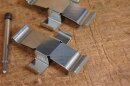 mounting kit for front brake pads